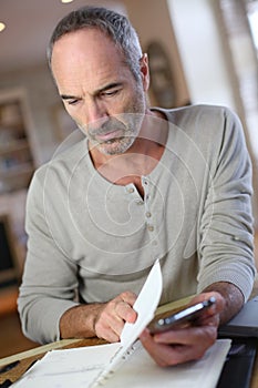 Middle-aged man working from home