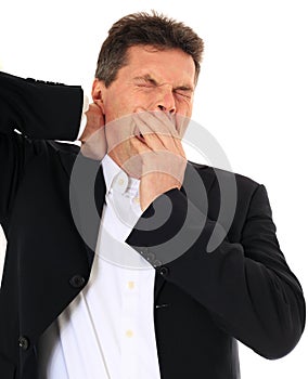 Middle-aged man yawning