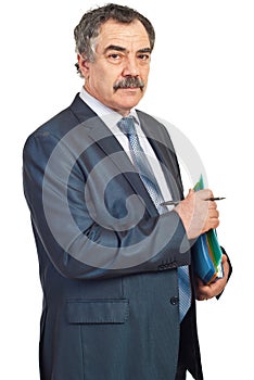 Middle aged manager with folders