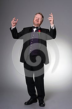 Middle aged opera singer performing