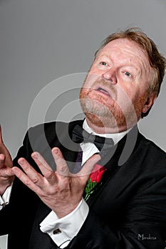 Middle aged opera singer performing photo