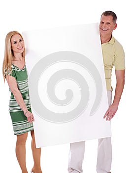 Middle aged smiling couple holding