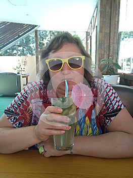 Middle-aged woman in a cafe