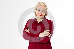 Middle-aged woman with crossed arms, middle age cute woman posing at white background