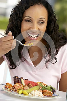 Middle Aged Woman Dining Al Fresco