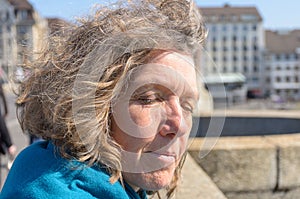 Middle-aged woman enjoying the spring sunshine
