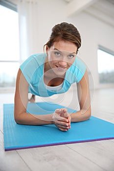 Middle-aged woman exercising