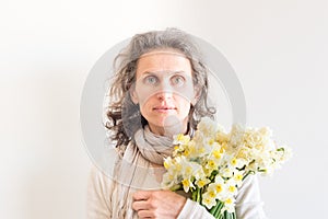 Middle aged woman with flowers