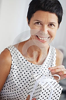 Middle aged woman with a gift