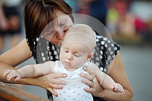 Middle aged woman and her adorable little grandson