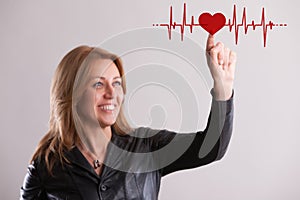 Middle-aged woman highlights heart care, timeless love