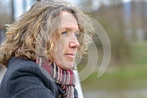 Middle aged woman looking away