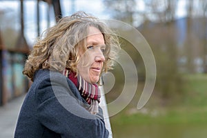 Middle aged woman looking away