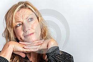 Middle Aged Woman Looking Inquisitive or Questioning photo