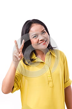 Middle aged woman pointing up 2 fingers