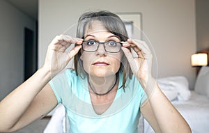 Middle aged woman with poor eyesight