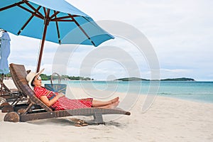 Middle aged woman relaxing at chaweng beach in koh samui ,Thailand