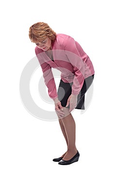 Middle aged woman suffering from knee pain, joint injury or arthritis