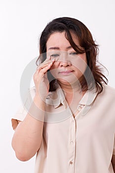 Middle aged woman with vision issue, myopia, hyperopia, eye issue photo