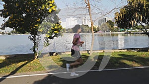 Middle-aged women in gym clothes Run and jog in the park