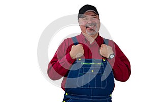 Middle-aged worker in dungarees with a proud smile