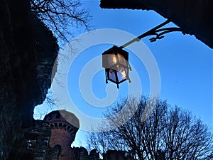 Middle Ages, medieval lamp and castle in Turin city, Italy