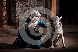 Nun Talking to Dog photo