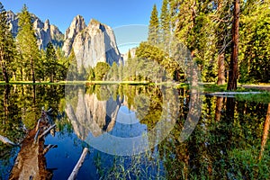 Middle Cathedral Rock reflecting in Merced River at Yosemite