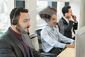 Middle east male call center or help desk or telephone support agent working at call center