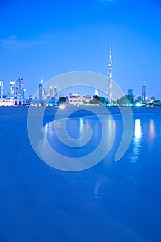 Middle East, United Arab Emirates, Dubai, City Skyline & Burj Khalifa at Dusk from Jumeirah Beach