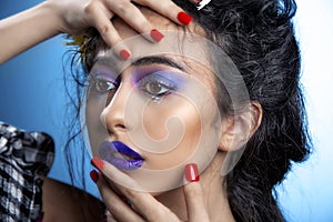 Middle Eastern Arabic beauty model with dark blue lips