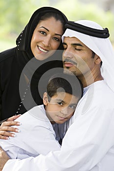 A Middle Eastern couple and their son