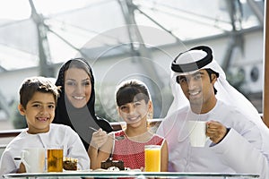 A Middle Eastern family enjoying a meal