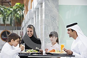 A Middle Eastern family enjoying a meal