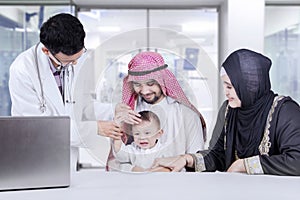 Middle eastern family in the hospital