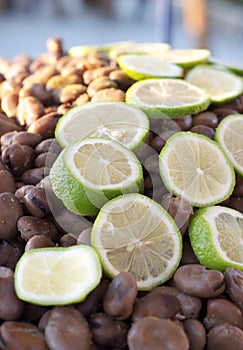 Middle Eastern food with beans and limes