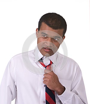 Middle eastern man fixing tie