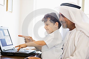 A Middle Eastern man and his son