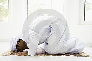 A Middle Eastern man praying