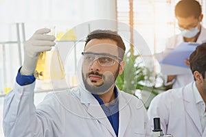 Middle Eastern man scientist expertise in laboratory research biology.