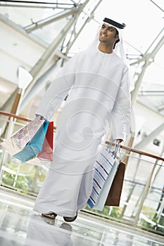 A Middle Eastern man in a shopping mall