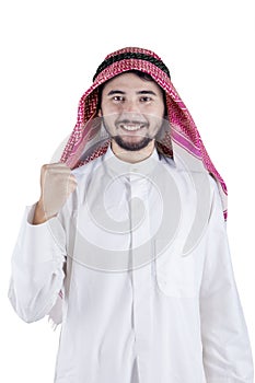 Middle eastern person expressing his success