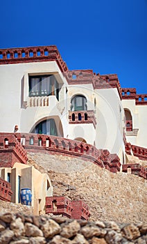 Middle Eastern style residential building on a cliff