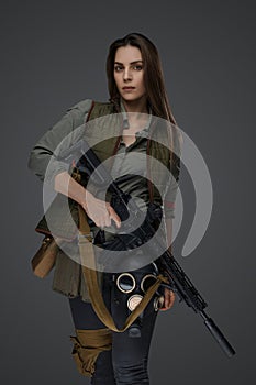 Middle Eastern Survivalist Woman with Rifle photo