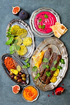 Middle Eastern traditional dinner. Authentic arab cuisine. Meze party food. Top view, flat lay