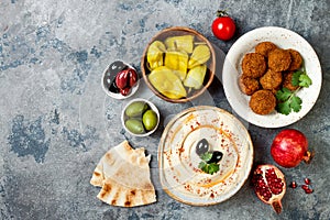 Middle Eastern traditional dinner. Authentic arab cuisine. Meze party food. Top view, flat lay, overhead.