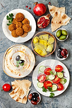 Middle Eastern traditional dinner. Authentic arab cuisine. Meze party food. Top view, flat lay, overhead.