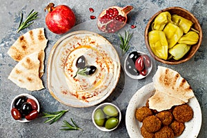 Middle Eastern traditional dinner. Authentic arab cuisine. Meze party food. Top view, flat lay, overhead.