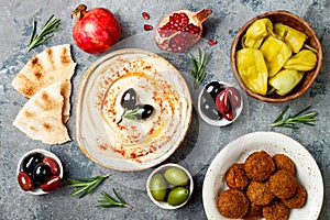 Middle Eastern traditional dinner. Authentic arab cuisine. Meze party food. Top view, flat lay, overhead.