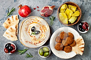 Middle Eastern traditional dinner. Authentic arab cuisine. Meze party food. Top view, flat lay, overhead.